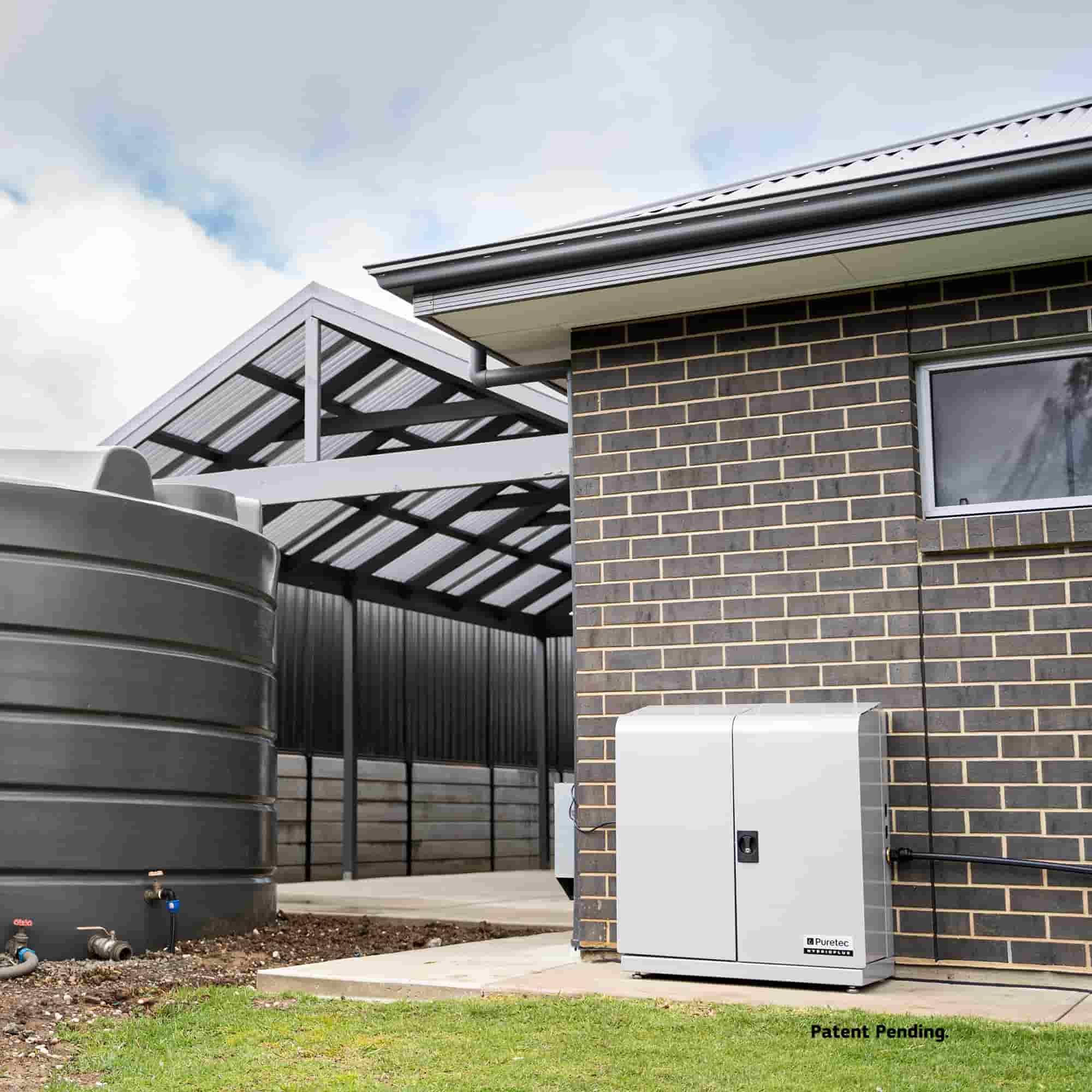 Puretec Hybrid filtration cabinet plumbed up outside a house